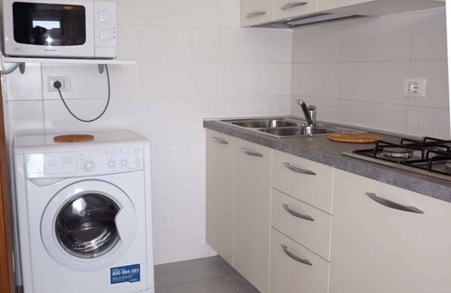 Porto Santa Margherita Apartment | City apartment with beach service included