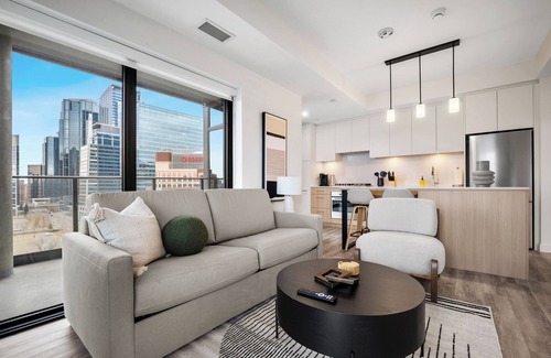 Eau Claire Apartment | City Sophistication w 2 BR River View, Parking, Office