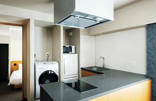 Shinkawa Apartment | City View Two-Bedroom Suite | 250m Stroll to Hatchobori Station |
