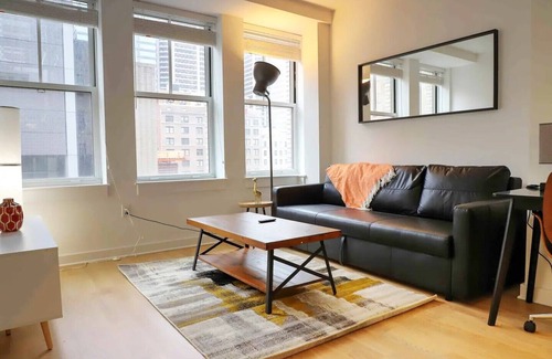 Midtown Village Apartment | City VIEW with King Bed, GYM, Rooftop, and Lounges