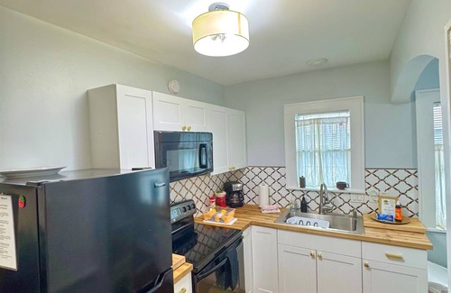 Historic Uptown House | Close to all with a King-bed! Bikes included