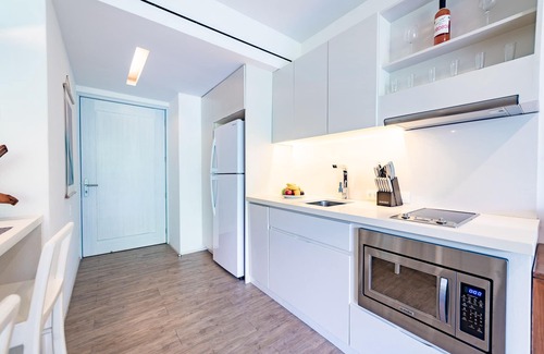R Condo | Close to Town and Beach | Studio with Private Terrace in Mixie Condos