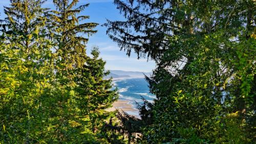 Neahkahnie Beach House | Coastal escape w balcony firebowl ocean views near Manzanita Sunset House by AvantStay