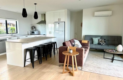 Mangawhai House | Coastal Vibes - Modern, well-equipped, family friendly home with lovely Estuary views