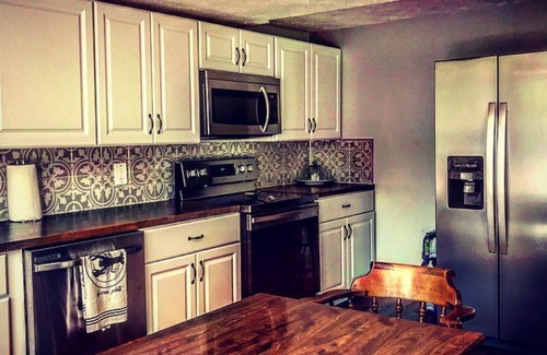 Falls House | Come stay in the beautiful endless mountains on the bank of the River