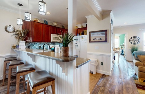 Hatteras Condo | Comfortable condo with shared pool, free WiFi, central AC, and water views