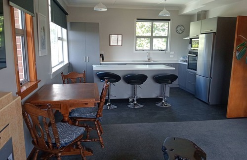 Oamaru House | Comfortable family home with beautiful wild gardens to enjoy.