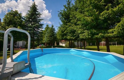 Darlowo House | Comfortable holiday homes with a summer pool