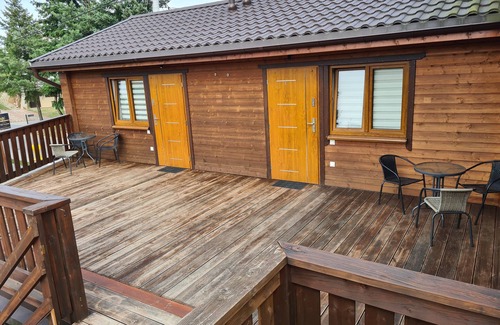 Powidz Apartment | Comfortable rooms near the lake.