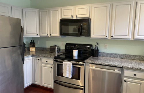 Laconia Condo | Comfy lake condo, great location to swim, boat, hike, ski & more!
