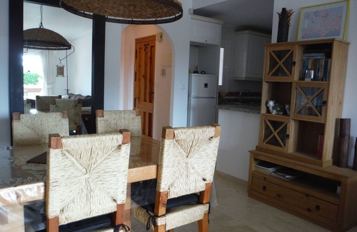 Orihuela Costa Apartment | condo in cozy garden beside the pool.