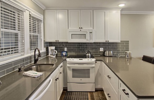 Boyne City Condo | Condo with Lake Charlevoix Views | Private Beach Access | Gas Log Fireplace