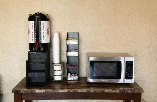 Council Bluffs Hotel | Convenient Stay, Superb Location! 2 Budget-friendly Units with Kitchenettes