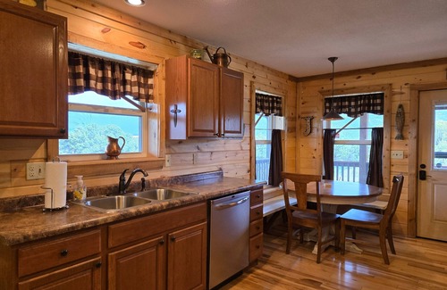 Alpine Village Cabin | Conveniently located cabin with full kitchen, w/d, large deck & great views