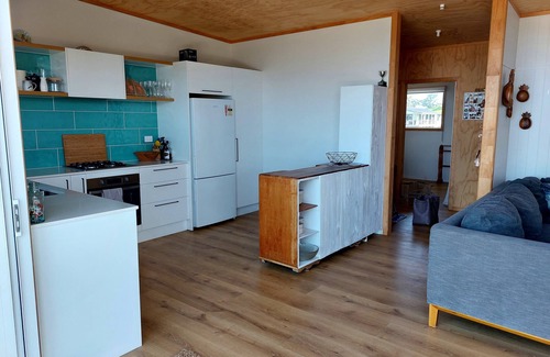 Pataua House | Cool & Funky Bach just one back from the beach at Pataua North