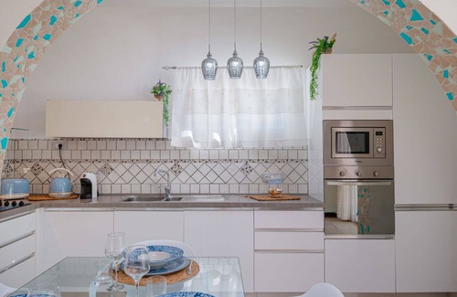 Eden Beach Villa | Cosy apartment in villa for 5 guests with pool, WIFI, A/C, TV, patio and parking