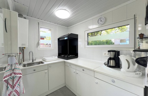 Geel Ski Chalet | Cosy holiday home by the water