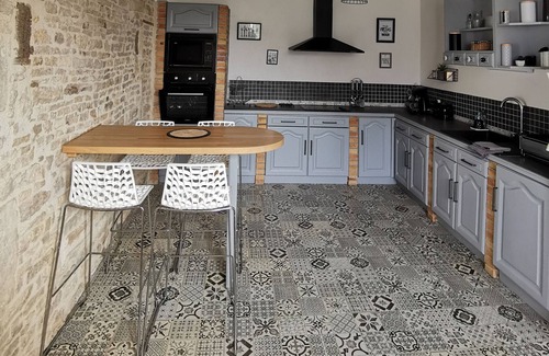 Rom Cottage | Cottage 'Gites De La Roche Elie Chez Leonie' with Shared Pool, Private Terrace and Wi-Fi