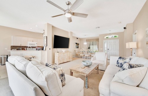 Herons Glen House | Country club retreat with private pool, water views, on-site golf, & gym