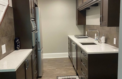 Calgary Apartment | Country oasis, new finishes with city convenience.