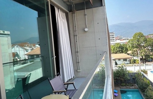 Nimman House | Cozy loft-style rooms, private baths, free Wi-Fi, A/C, and shared spaces.