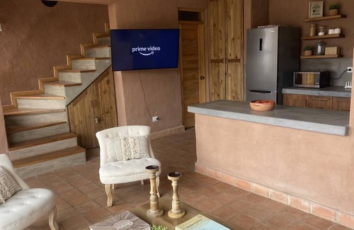 Huayllabamba Ski Chalet | Cozi house with fireplace overlooking the Sacred Valley of the Incas