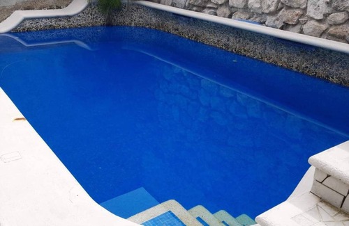 Colonia Independencia Apartment | Cozumel peaceful retreat, WIFI, pool TV, Kitchenet, walking distance to town.