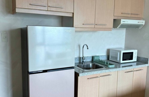 Wack-Wack Greenhills Condo | Cozy 1-BDR condo with AC, Hot Water, and WiFi in Brgy Wack-Wack Greenhills