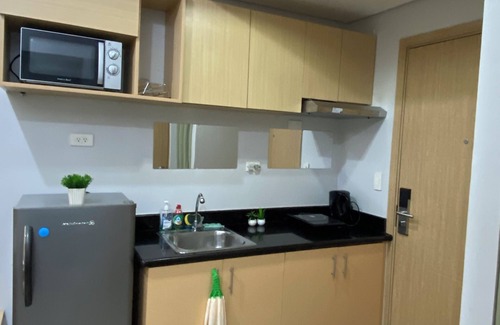 Project 8 Condo | Cozy 1-bedroom condo with AC, WiFi in charming Quezon City