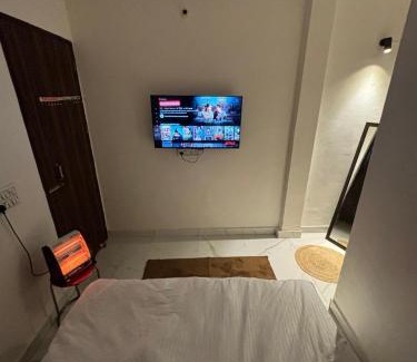 Rohini Apartment | Cozy 1 BHK Condo with amenities