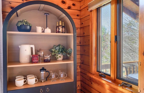 Creola Cabin | Cozy 2-bedroom cabin. Private and wooded setting, WiFi, Pond & Hot Tub