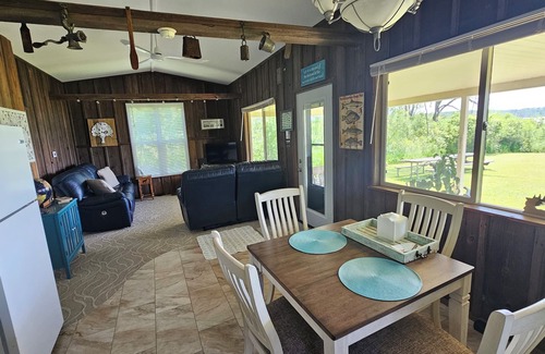 Allegan Cottage | Cozy 2-bedroom Waterfront Cottage with 80' dock on 2.5 Acres. Privacy Galore!