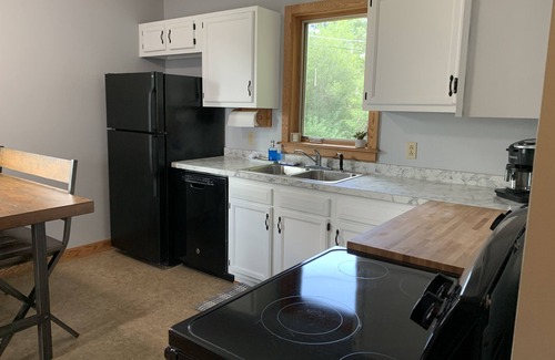 Calumet House | Cozy 3 bedroom home with garage & sauna