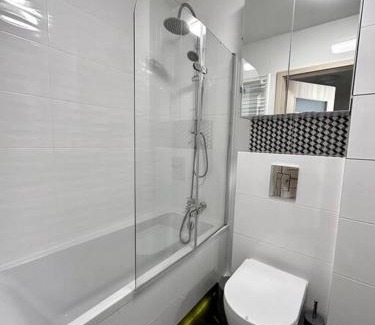 Fabryczna Apartment | Cozy apartment near Magnolia - Private Parking