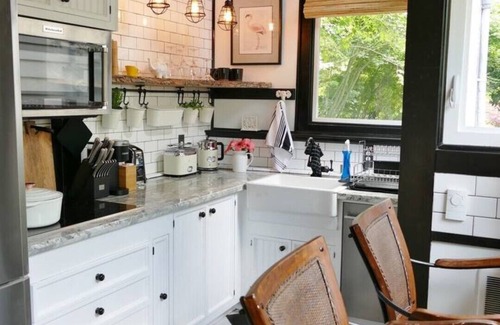 Fremont Cottage | Cozy Banana Cabana w/soaking tub heated floors in secluded garden