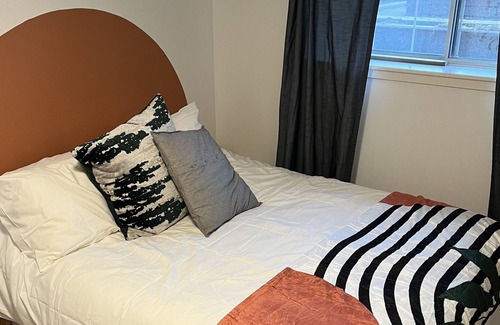 Cedarbrae House | Cozy basement suite w/fireplace. Pet friendly!