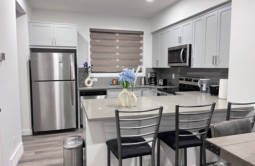 Northwest Calgary House | Cozy Beam family size townhouse convenient to go anywhere in city.