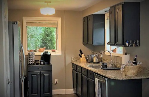 Port Huron Cottage | Cozy Black River Cottage with Private Dock and Boat Hoist-Sleeps 6