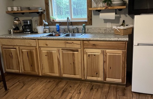 Hermitage Cabin | Cozy Cabin nestled on 10 acres just minutes from the lake and the speedway