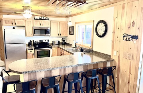 McHenry Cabin | Cozy cabin on the Lake with dock and hot tub!