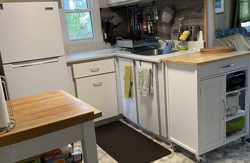 Alcona Cottage | Cozy cabin retreat steps to sandy, shallow beach