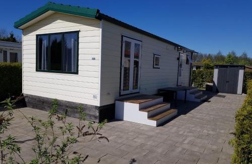 Berkhout Ski Chalet | Cozy chalet near Amsterdam at Camping Venhop