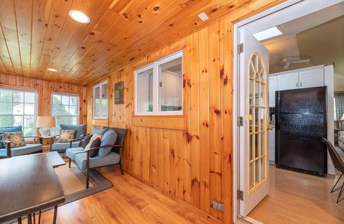 Walloon Lake Cottage | Cozy Cottage near Lake & Skiing, Hot Tub, fireplace & Fire-pit, Pets Allowed