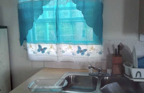 Andros Town House | Cozy cottage with AC, Washer & dryer, spacious, situated on the beach.