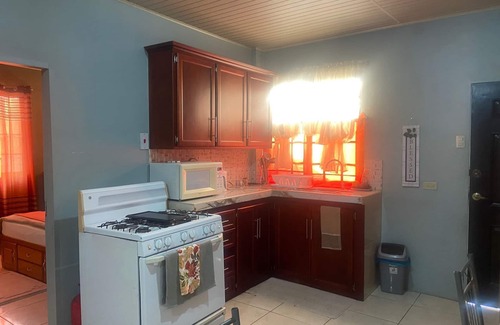 Penal-Debe Apartment | Cozy, family-friendly 2-bedroom apartment- Near Brian Lara & C3 mall