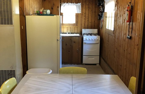 Pentwater Cabin | Cozy "Flip Flops" Cabin in the woods with Pentwater Lake frontage and access