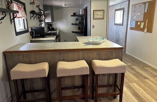 Avon House | Cozy lake front home on beautiful Lake Washington. Deck, dock and boat slip.
