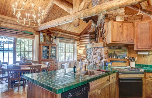 Spooner Cabin | Cozy Lake front luxury, hot tub, ice fish, snowmobile, fireplace, screened porch