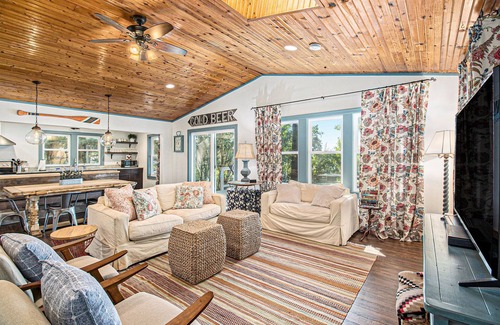 Allegan Cottage | Cozy, lakefront cabin with gas grill and wrap-around deck.