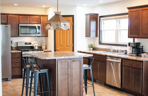 Manistee House | Cozy Lakefront Home, Minutes from Lake MI, 2 Bedrooms, 2 Bathrooms. Sleeps 6